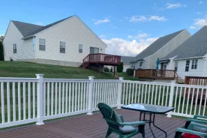 White Aluminum Fence Installation Around Residential Yard in West Chester, PA