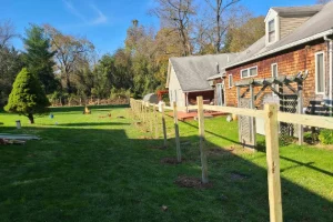 Split rail fence defining property edges naturally in West Chester, PA