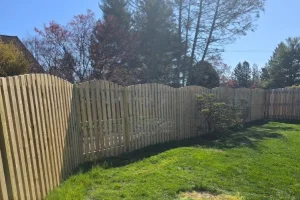 Scalloped Wood Privacy Fence Around Residential Lawn in West Chester, PA