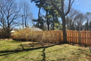 Backyard Wood Fence Installation Along Property Line in West Chester, PA